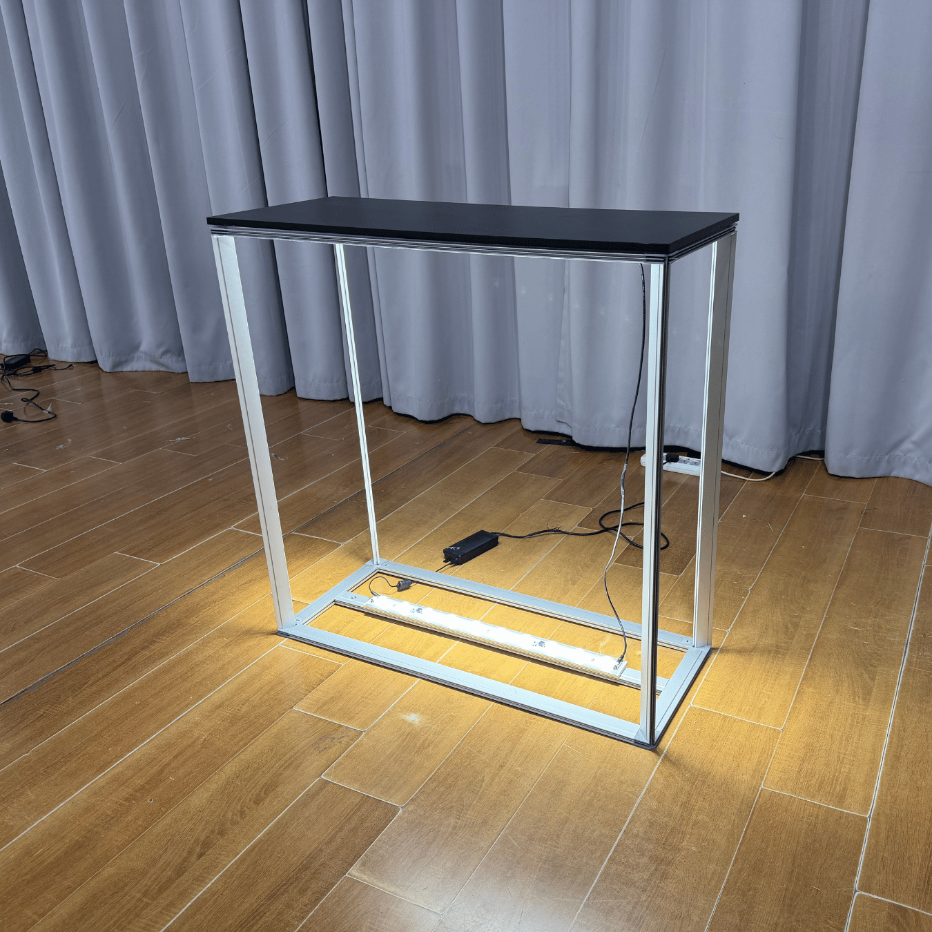 HelloDisplay SEG lightbox counter — illuminated exhibition counter, full setup view